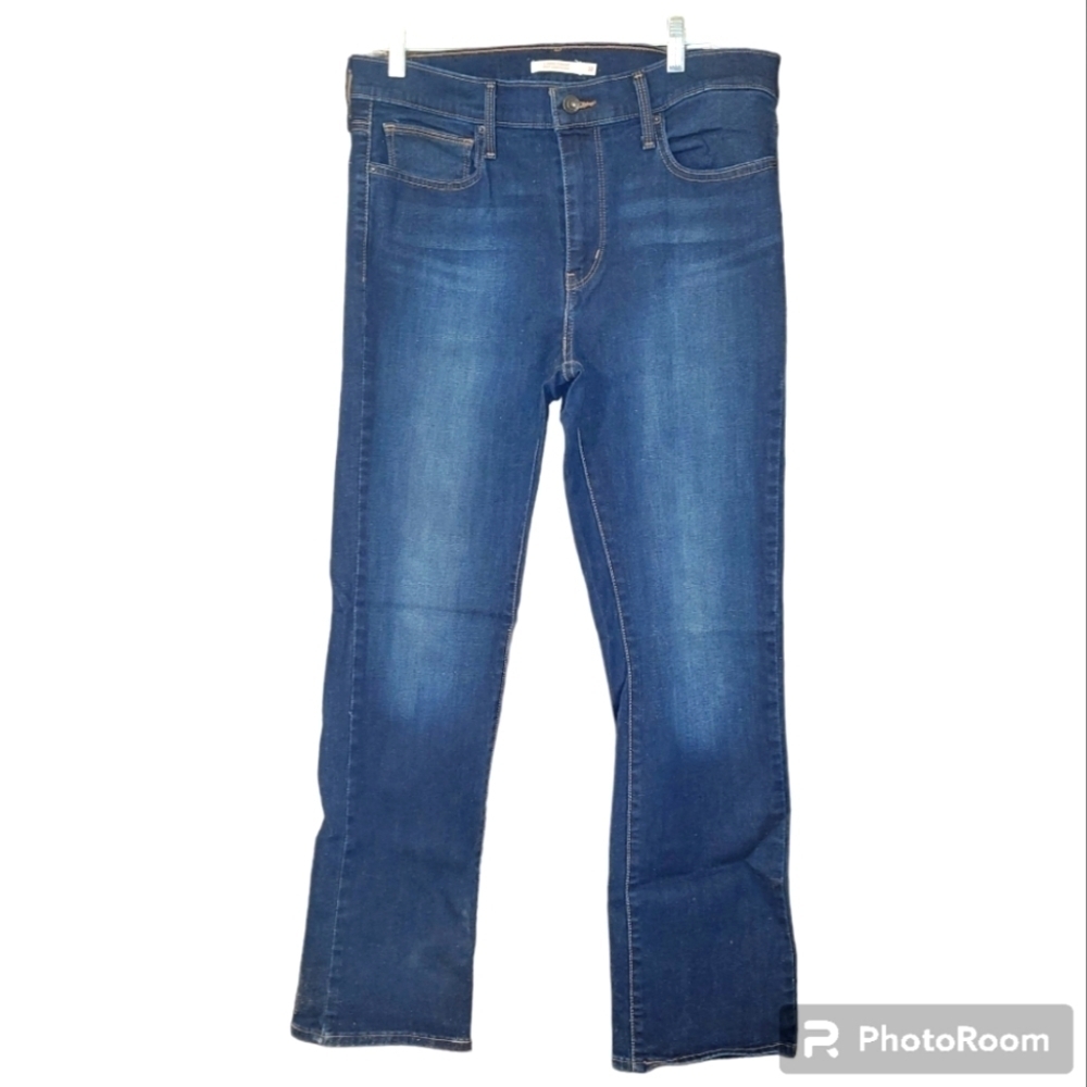 Levi's Slimming Straight medium wash  straight leg jeans with stretch